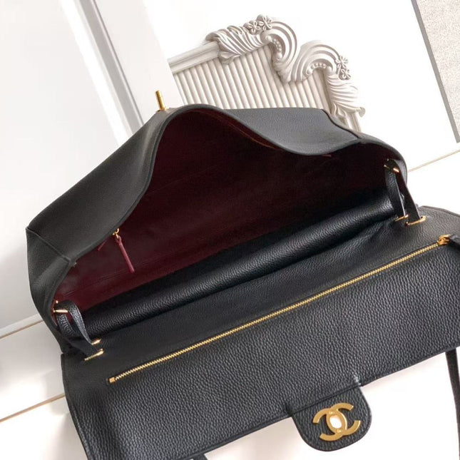 CHANEL 26S SOUPLISSIMO MAXI FLAP 39 IN BLACK GRAINED CALFSKIN GOLD HARDWARE