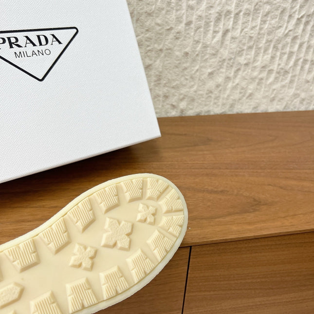 PRADA 25S PLATFORM FUR-LINED MULES IN WARM BEIGE SUEDE