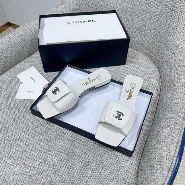 CHANEL 26S FLAT SLIDES IN WHITE LAMBSKIN
