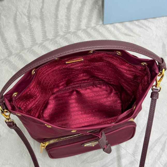 PRADA 25S DUET BUCKET BAG 23 IN BURGUNDY RE-NYLON GOLD HARDWARE
