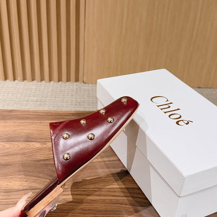 CHLOE 26S STUDDED FLAT MULES IN BURGUNDY CALFSKIN