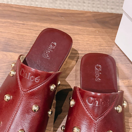 CHLOE 26S STUDDED FLAT MULES IN BURGUNDY CALFSKIN