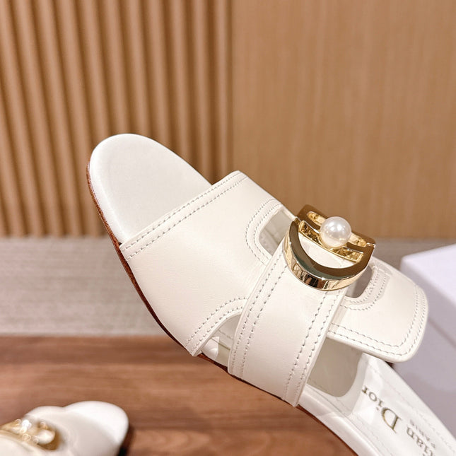 DIOR 26S LOW HEEL SLIDE SANDALS IN WHITE CALFSKIN GOLD PEARL BUCKLE