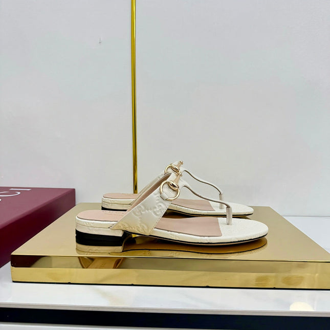 GG THONG SANDALS 25S IN WHITE LAMBSKIN WITH GOLD HARDWARE