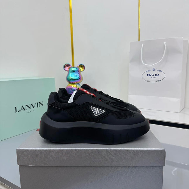 PRADA 25S CROSS LACED SNEAKERS IN BLACK CALFSKIN