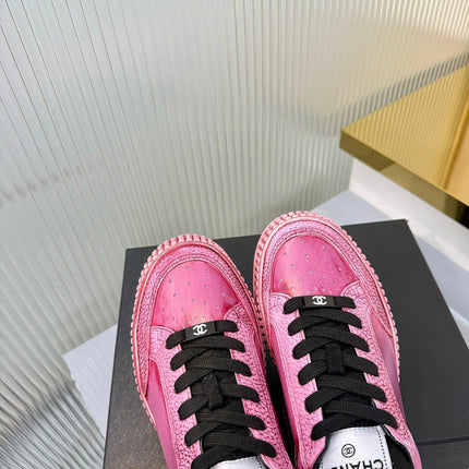 CHANEL 26S LOW-TOP SNEAKERS IN DARK PINK GRAFFITI PATTERN CALFSKIN