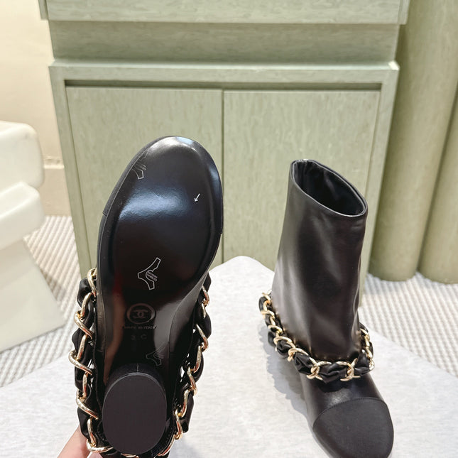 CHANEL 25S CALF-LENGTH BOOTS 45MM IN BLACK CALFSKIN GOLD HARDWARE