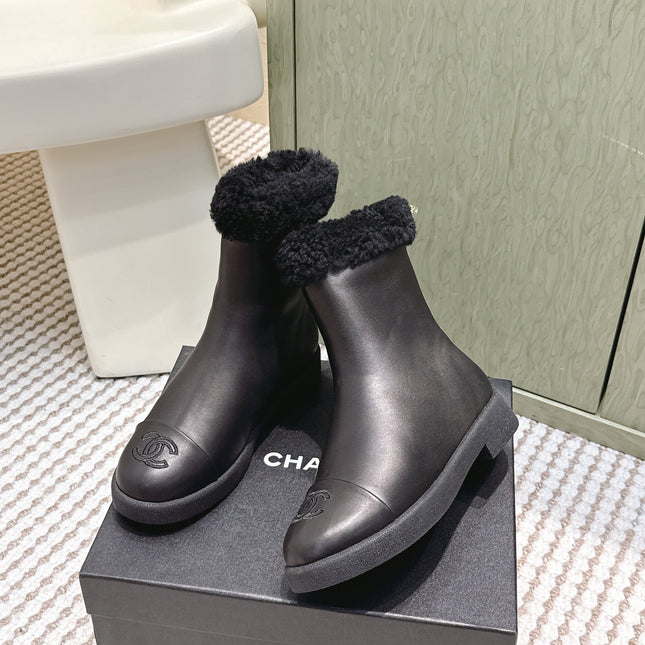 CHANEL 25S CALF-HIGH BOOTS IN BLACK CALFSKIN LINED WITH SHEEPSKIN