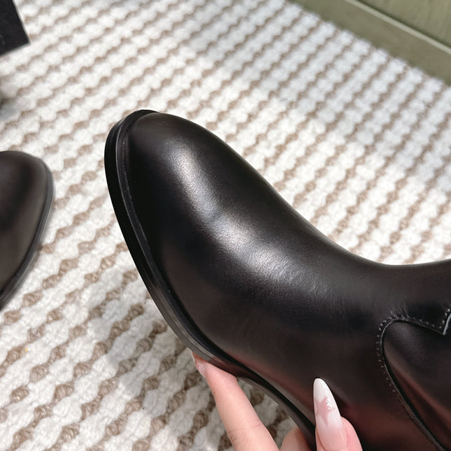 CHANEL 25S MID-CALF BOOTS IN BLACK CALFSKIN