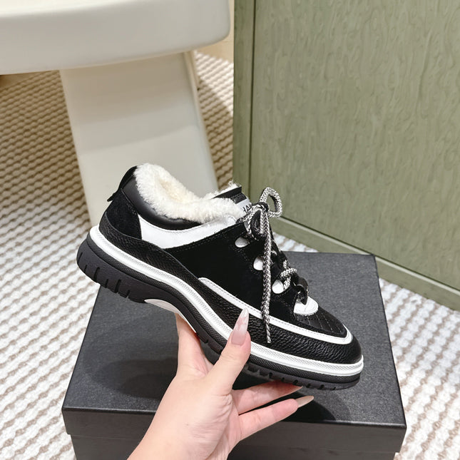 CHANEL 25S THICK-SOLE SNEAKERS IN BLACK AND WHITE CALFSKIN WITH FUR LINING