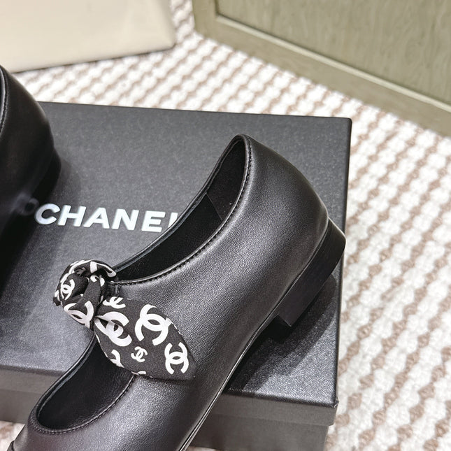 CHANEL 25S MARY JANES IN BLACK SHEARLING AND GROS GRAIN