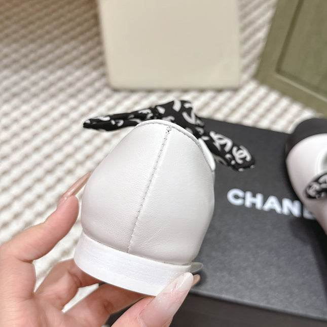 CHANEL 25S MARY JANES IN WHITE AND BLACK SHEARLING AND GROS GRAIN