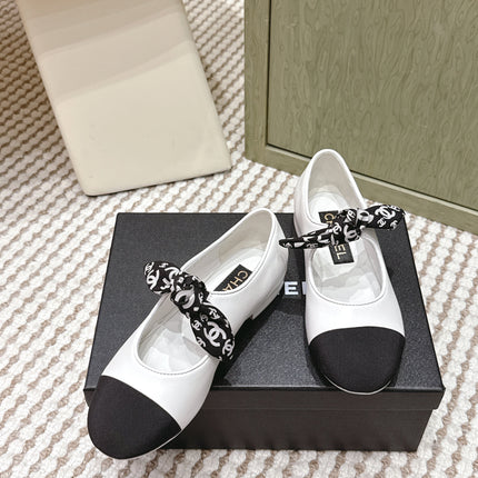 CHANEL 25S MARY JANES IN WHITE AND BLACK SHEARLING AND GROS GRAIN