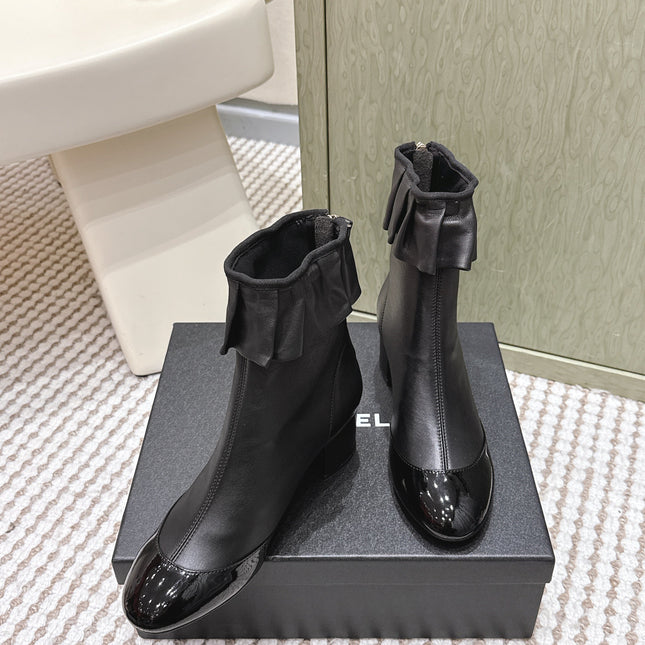 CHANEL 25S ANKLE BOOTS IN BLACK CALFSKIN GLOSSY TOE RUCHED