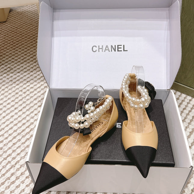 CHANEL 25S ESPADRILLE FLATS IN BEIGE AND BLACK CALFSKIN WITH PEARL STRAP