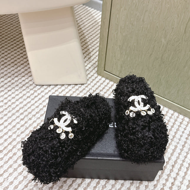CHANEL 25S CLASSIC FURRY SLIDES IN BLACK WITH DOUBLE C LOGO