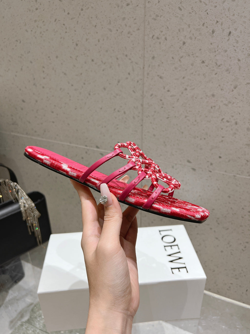 LOEWE 26S BRAIDED CAGE SLIDE SANDALS IN CORAL PINK CALFSKIN