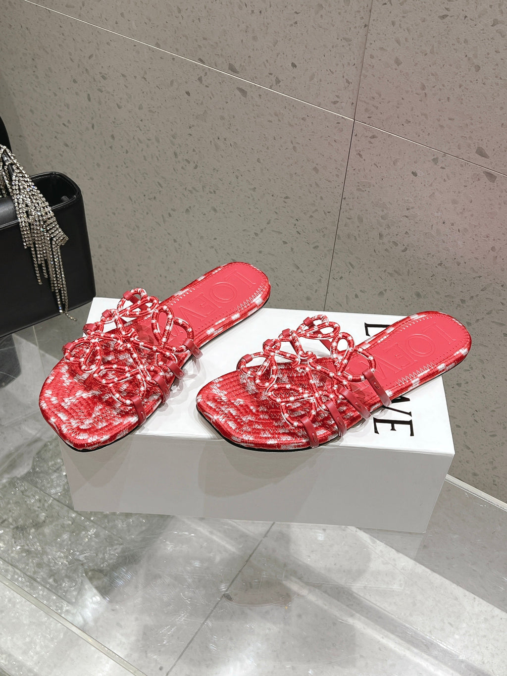 LOEWE 26S BRAIDED CAGE SLIDE SANDALS IN CORAL PINK CALFSKIN