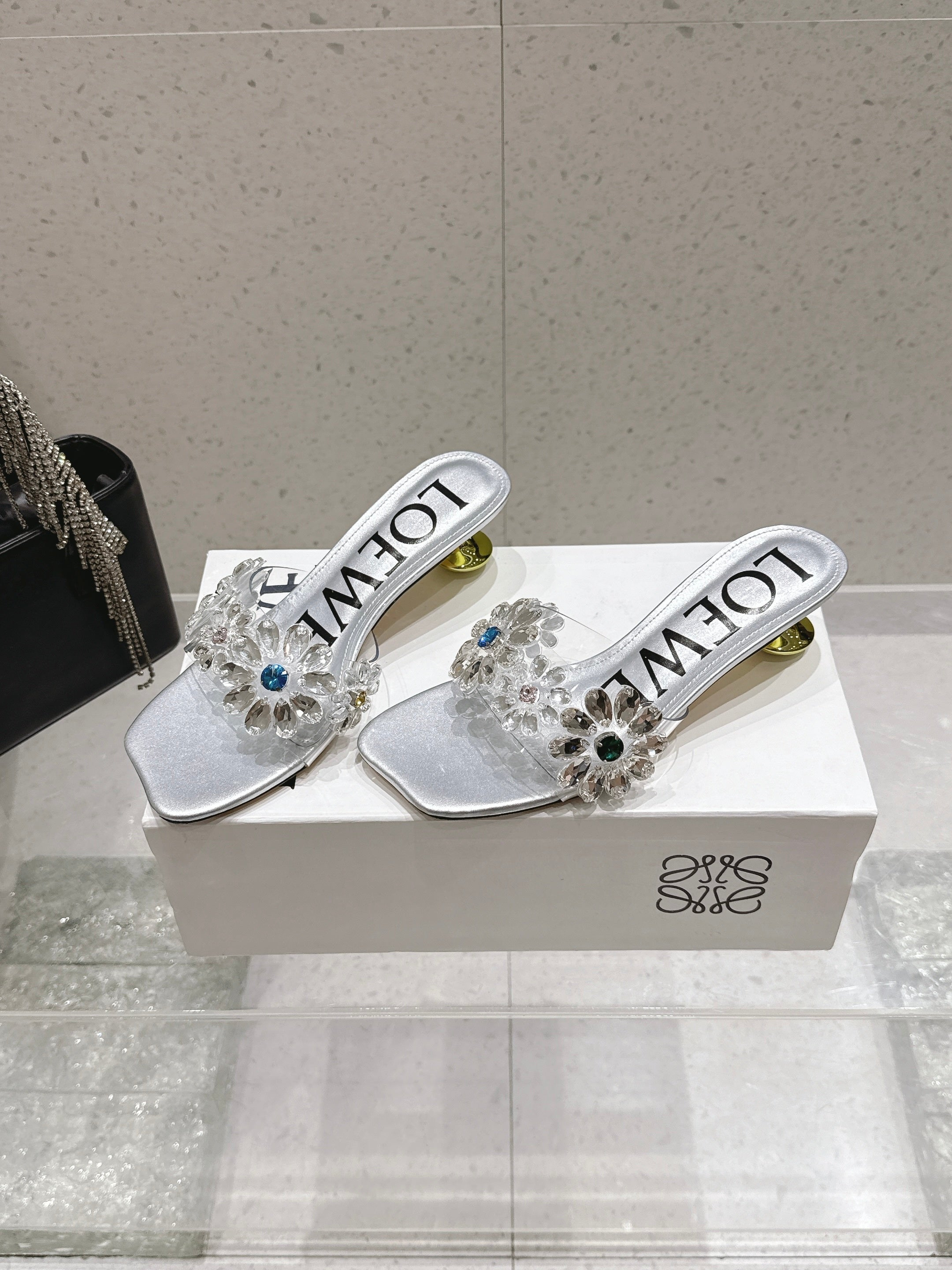 LOEWE 26S MULE HEELS 45MM IN SILVER PVC WITH CRYSTAL FLORAL