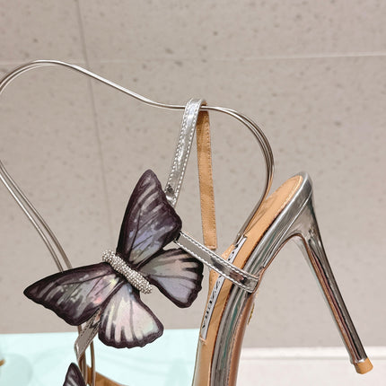 AQUAZZURA 26S BUTTERFLY HEEL SANDALS 100 MM IN SILVER CALFSKIN