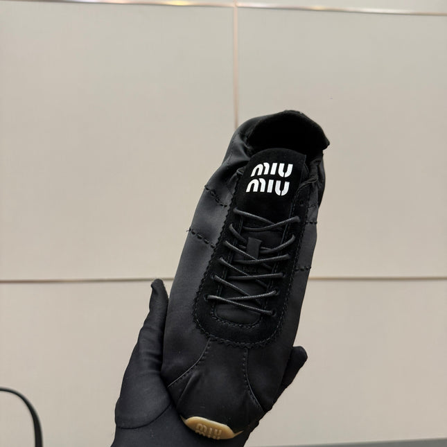 MIUMIU 25S SNEAKERS IN BLACK PLUME SATIN
