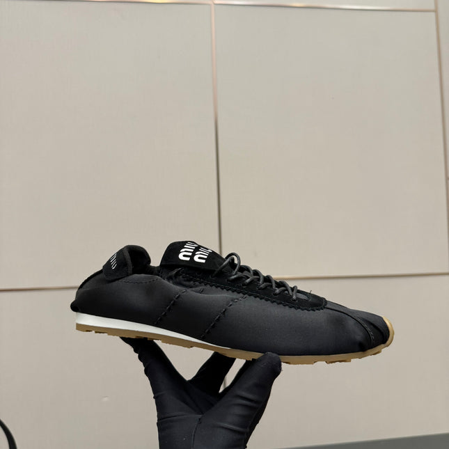 MIUMIU 25S SNEAKERS IN BLACK PLUME SATIN