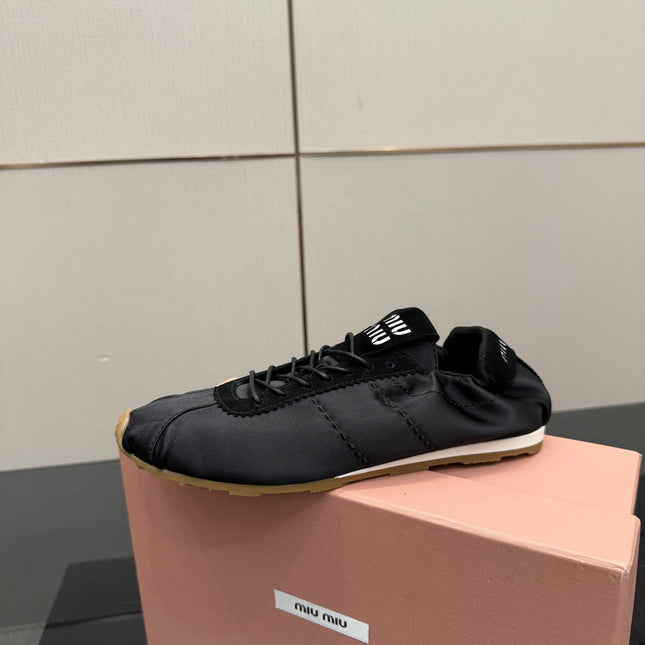 MIUMIU 25S SNEAKERS IN BLACK PLUME SATIN
