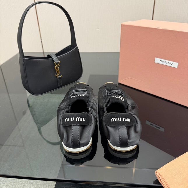 MIUMIU 25S SNEAKERS IN BLACK PLUME SATIN