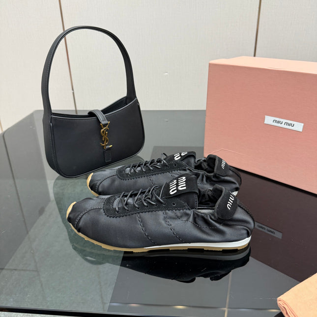 MIUMIU 25S SNEAKERS IN BLACK PLUME SATIN
