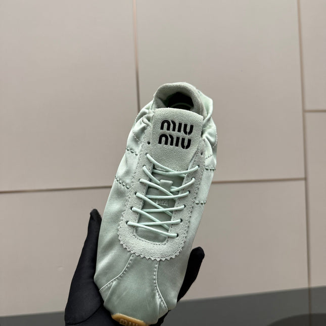 MIUMIU 25S SNEAKERS IN POWDER BLUE PLUME SATIN