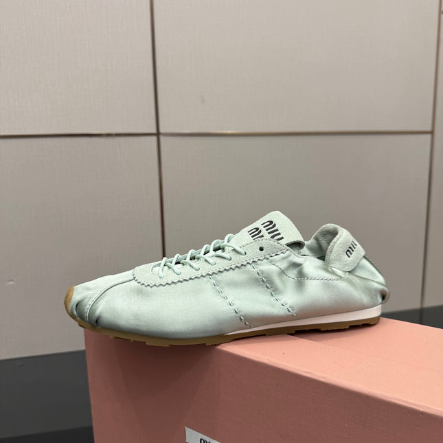 MIUMIU 25S SNEAKERS IN POWDER BLUE PLUME SATIN