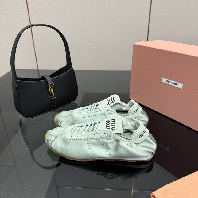 MIUMIU 25S SNEAKERS IN POWDER BLUE PLUME SATIN