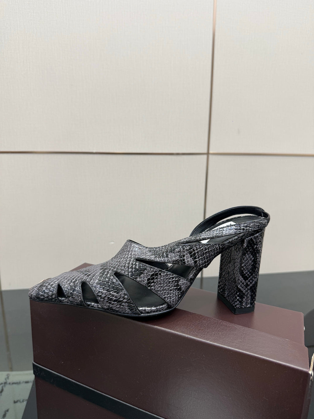 ALAIA 26S HEELED SLINGBACKS IN BLACK PYTHON-EMBOSSED LEATHER