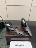 ALAIA 26S HEELED SLINGBACKS IN BLACK PYTHON-EMBOSSED LEATHER