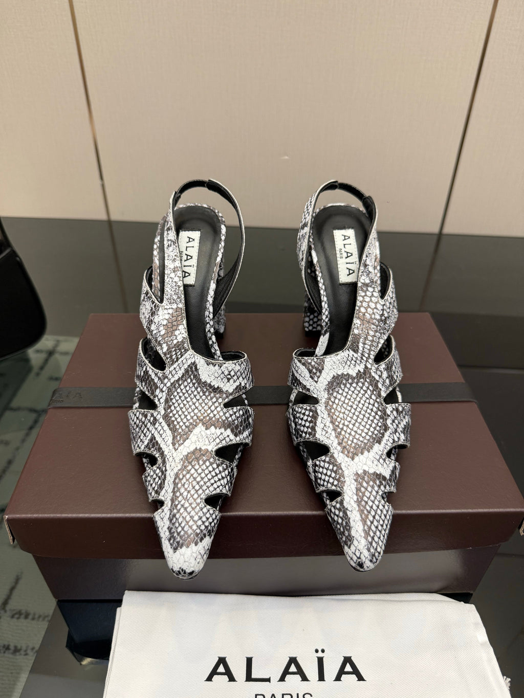 ALAIA 26S HEELED SLINGBACKS IN PYTHON-EMBOSSED LEATHER