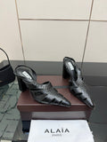 ALAIA 26S HEELED SLINGBACKS IN BLACK CROC-EMBOSSED LEATHER