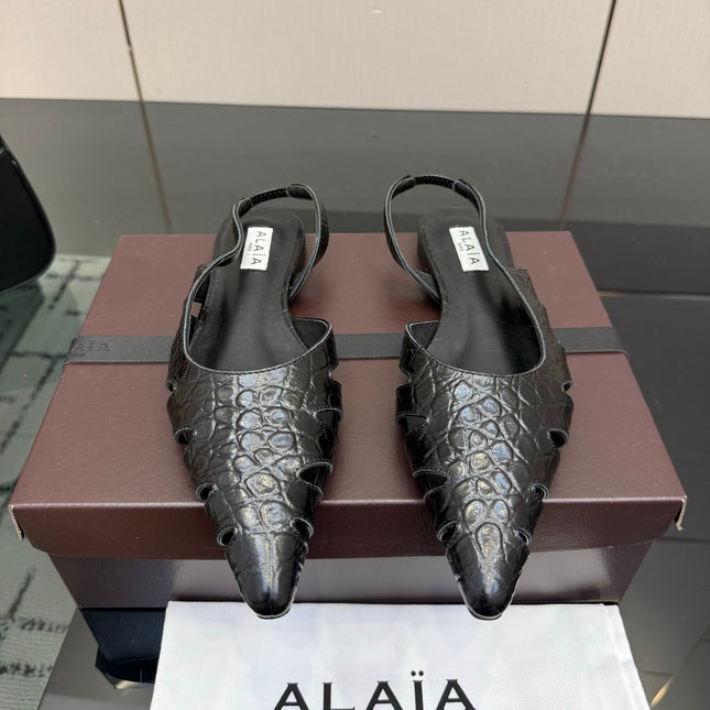 ALAIA 26S CUT-OUT SLINGBACK FLATS IN BLACK CROC-EMBOSSED LEATHER