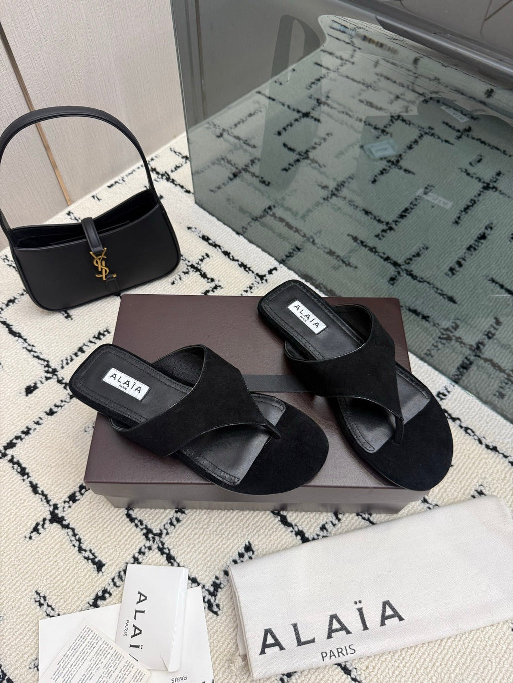 ALAIA 26S THONG MULE SANDALS IN BLACK SUEDE