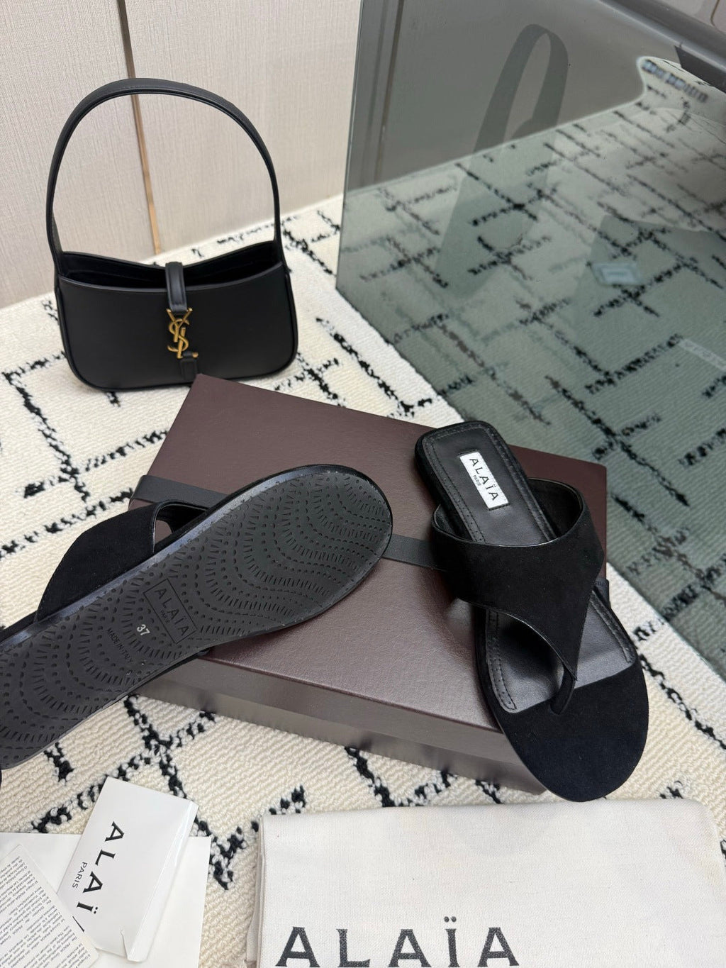 ALAIA 26S THONG MULE SANDALS IN BLACK SUEDE