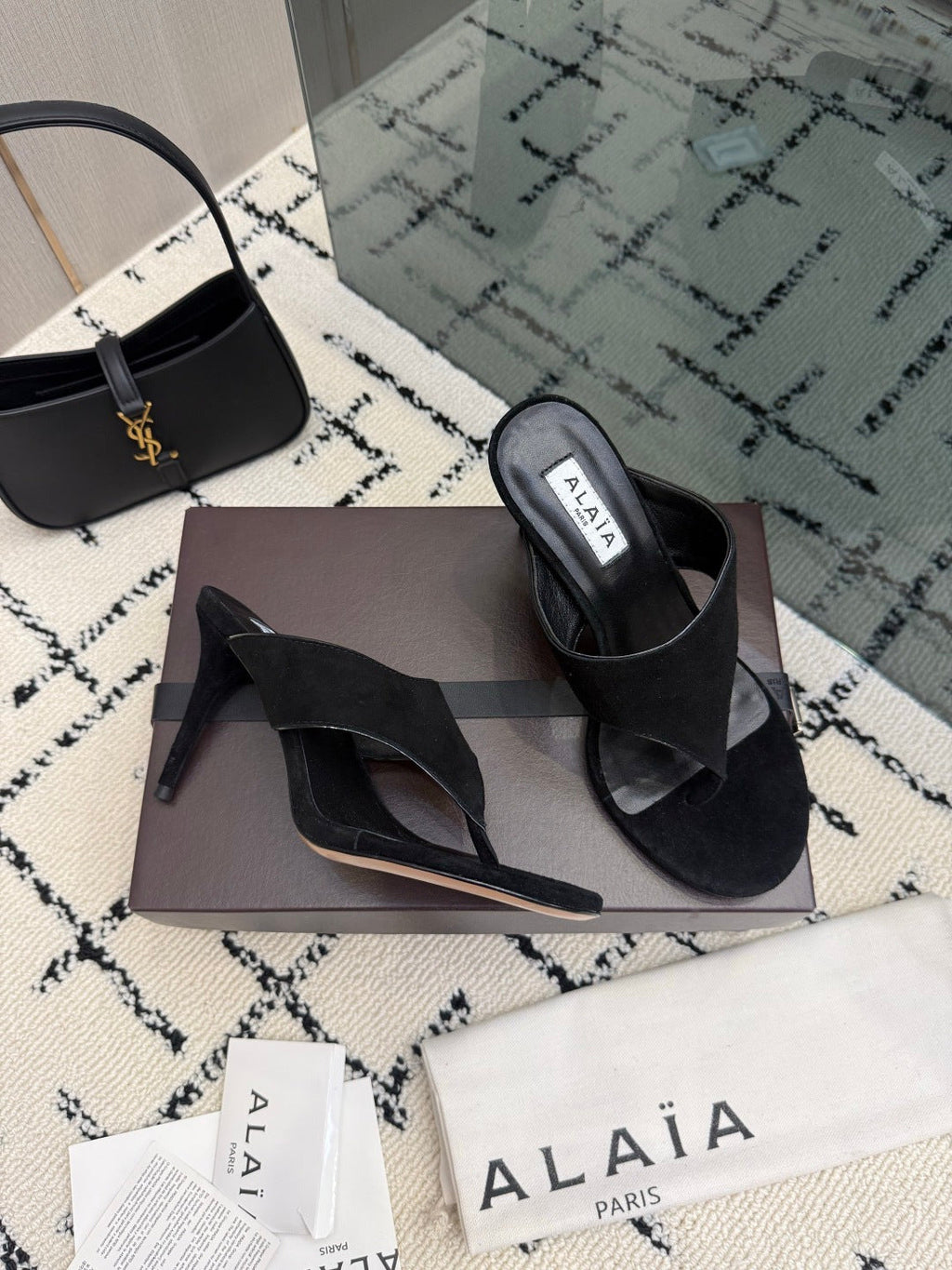 ALAIA 26S HEELED THONG MULE SANDALS IN BLACK SUEDE