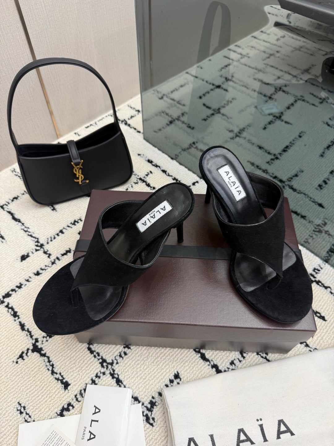 ALAIA 26S HEELED THONG MULE SANDALS IN BLACK SUEDE