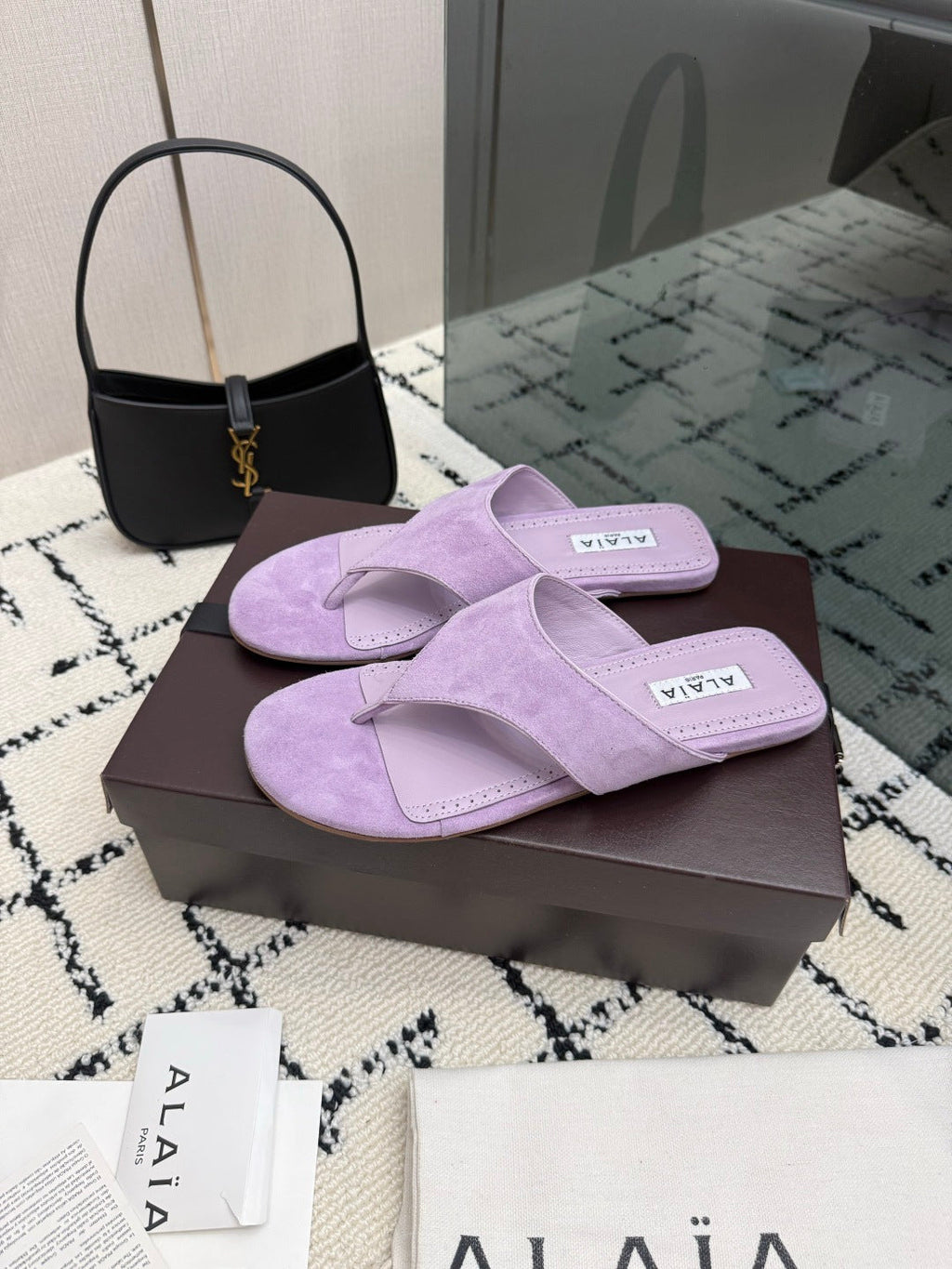 ALAIA 26S THONG MULE SANDALS IN PURPLE SUEDE