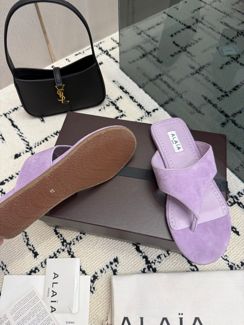 ALAIA 26S THONG MULE SANDALS IN PURPLE SUEDE