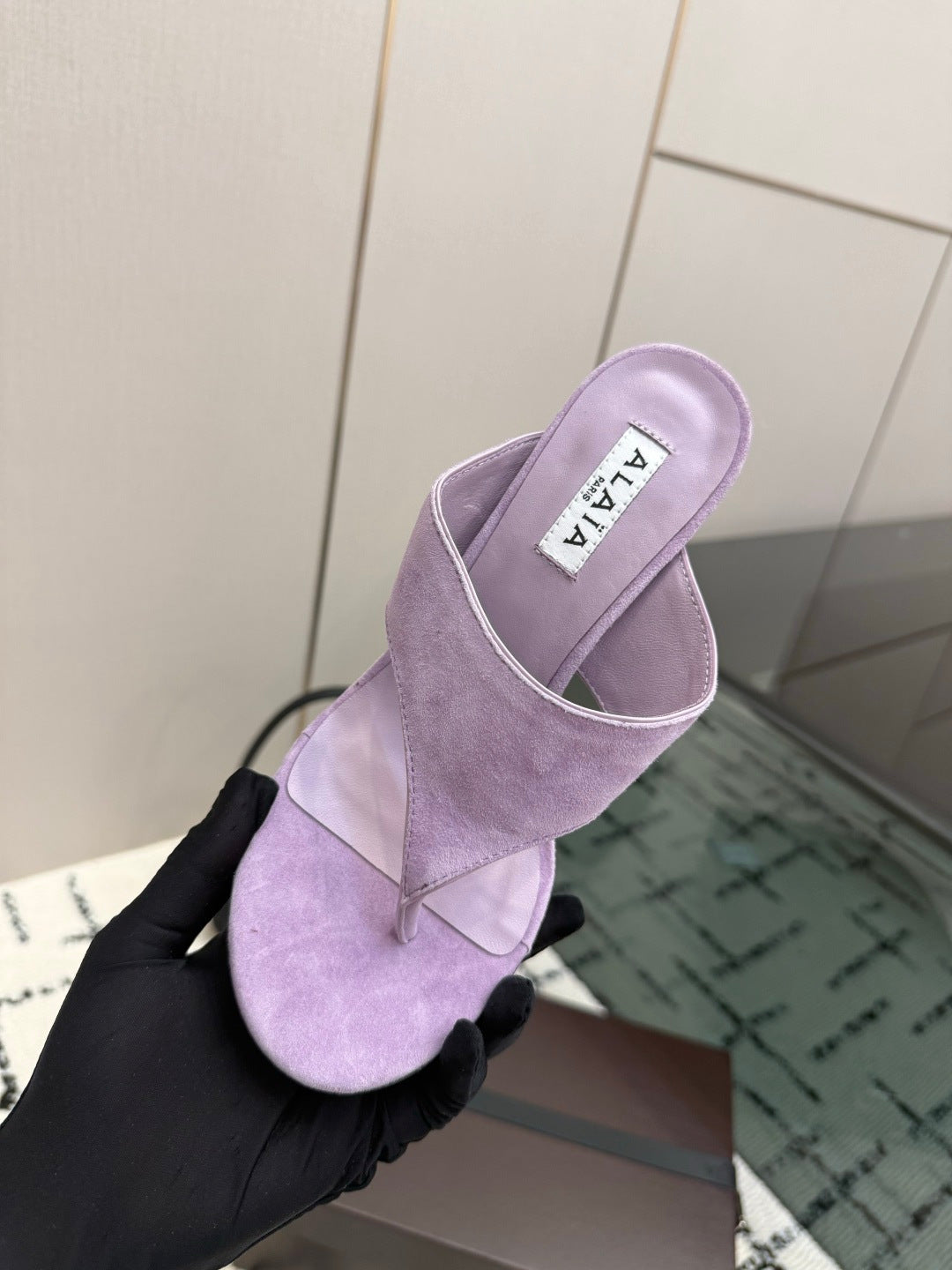 ALAIA 26S HEELED THONG MULE SANDALS IN PURPLE SUEDE