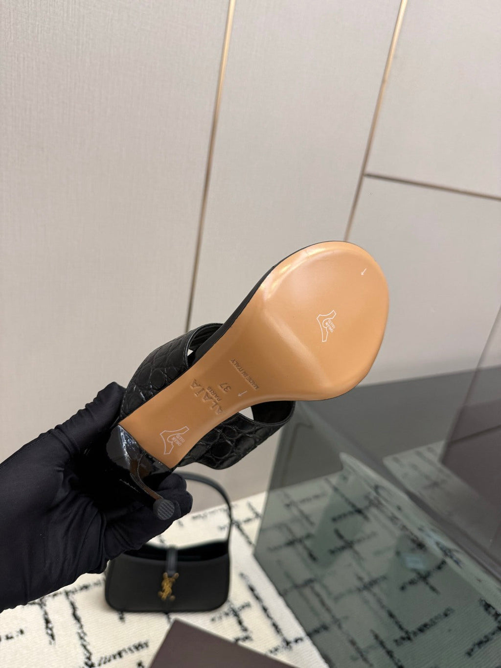 ALAIA 26S HEELED THONG MULE SANDALS IN BLACK CALFSKIN