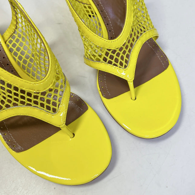ALAIA 26S MESH THONG HEELS 55 MM IN YELLOW PATENT CALFSKIN