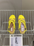 ALAIA 26S FLAT MESH THONG SANDALS IN YELLOW PATENT CALFSKIN
