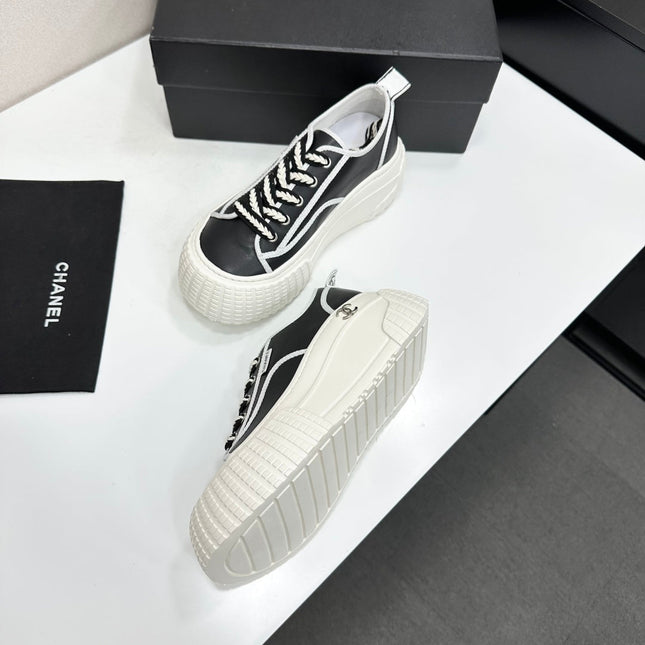 CHANEL 26S CHUNKY SNEAKERS IN BLACK AND WHITE CALFSKIN