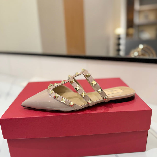 VALENTINO 26S STUDDED FLAT MULES IN NUDE PATENT CALFSKIN