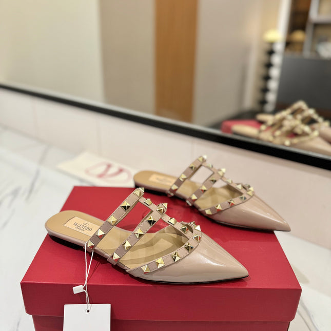 VALENTINO 26S STUDDED FLAT MULES IN NUDE PATENT CALFSKIN